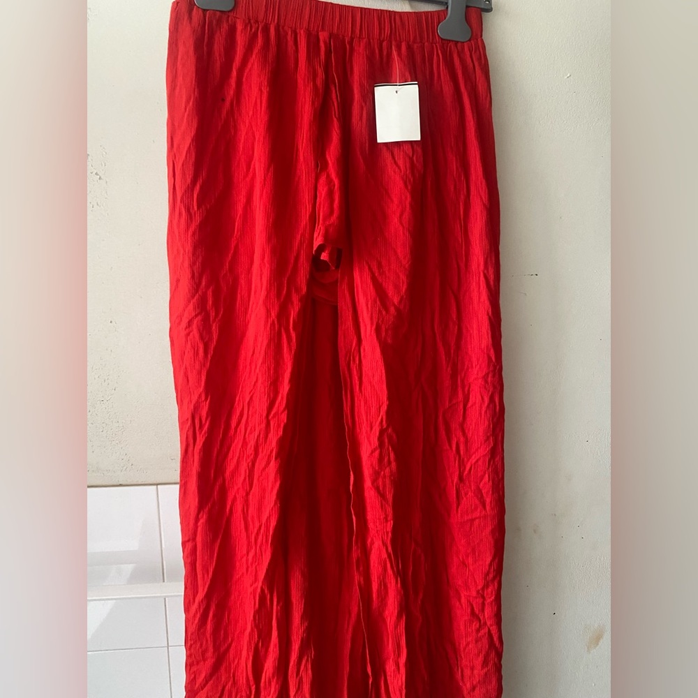 Red short attached to a dress